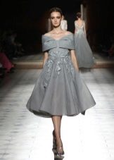 Dress with lowered sleeves in the style of style