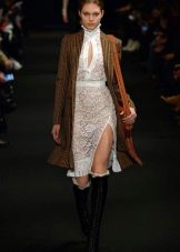 Fitted lace dress with a slit