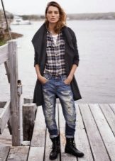 With ripped jeans