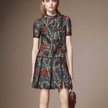 Dress with a low waist skirt pleated