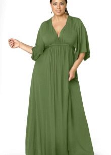 Long, trapezoid green dress para sa isang buong babae