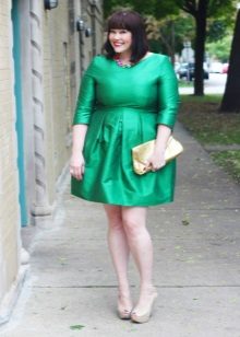Three-quarter-length A-line green dress with full-length sleeves