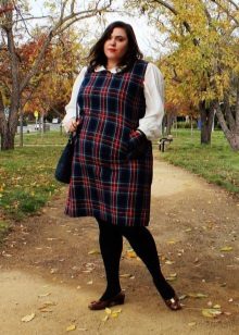 Dress in a cage with a white collar and bulgy long sleeves for obese women
