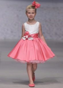 Dress in retro style with a fluffy skirt short for a girl