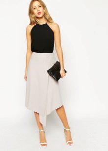 Asymmetrical skirt and light sandals
