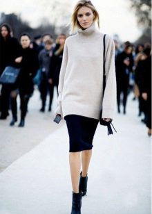 medium-length pencil skirt with a loose sweater