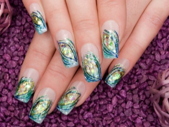 Mga pattern para sa isang manicure sa ilalim ng asul na damit