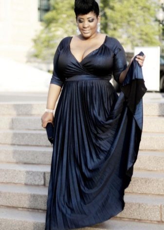 Black dress in a floor for full with V-shaped cut