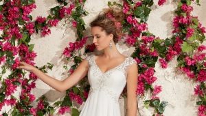 Mataas na waisted bridal gowns para sa isang walang kamali-mali silweta