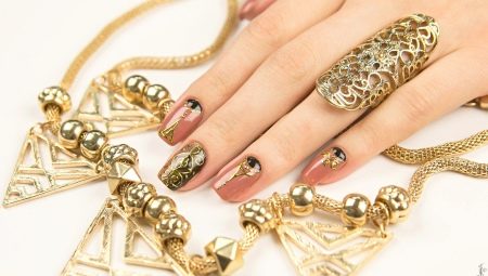 Manicure na may mga elemento ng ginto: mga tampok ng dekorasyon at mga trend ng fashion