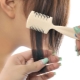 Comb with a blade for cutting hair