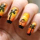 Black-orange manicure: kagandahan at apela